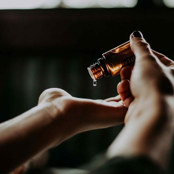 Reflexogenic massage on the meridians of the head with essential oils